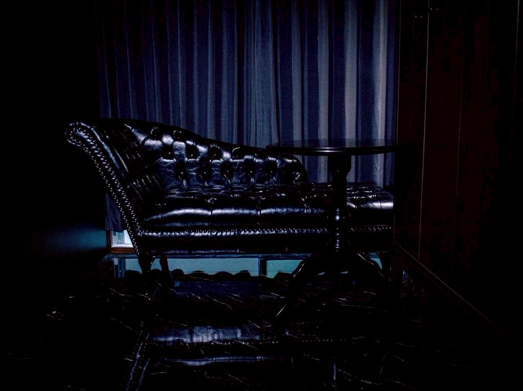 Military area — black leather and blue curtain
